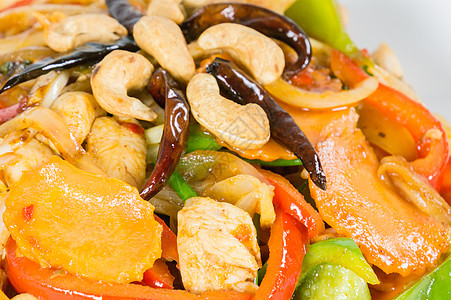 配鸡和糖粉的腰果坚果午餐洋葱白色营养食物健康胡椒蔬菜辣椒萝卜图片