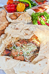 猪肉烤肉土豆野餐蔬菜橙子盘子烧烤熏肉餐厅洋葱午餐图片