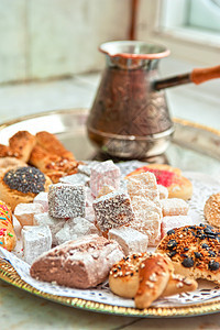 土耳其喜悦的甜点糕点糖浆咖啡店脚凳小吃果仁异国开心果核桃糖果图片