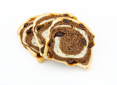 白背景的葡萄干巧克力面包庆典吃饭李子糕点面粉午餐食物香草蛋糕螺旋图片