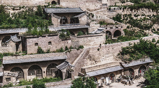 中国的李家山霍比顿城市日落寺庙艺术住宅吸引力旅游天空历史性建筑物图片