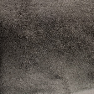 灰色皮质贴合奶牛奢华纺织品折痕衣服隐藏牛皮材料皮肤动物图片