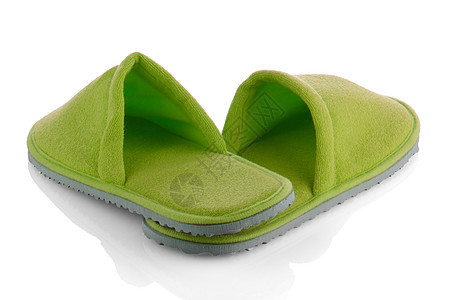 一对绿色的拖鞋鞋类家居旅行浴室房子用品休息就寝裙子时间图片