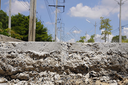 分层切割道路工作公用事业挖掘机裂缝地面街道水泥土壤建造石头图片