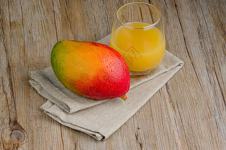 新鲜芒果汁服务水壶果汁甜点异国橙子液体情调水果热带图片
