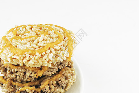 旧泰国古老的甜点 由大米豆粉炒饭制成甘蔗圆圈食物饼干糖果黄色烹饪模具油炸蜜饯图片