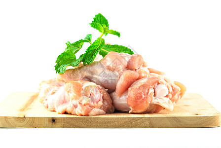 切肉板上的鸡翅肉皮肤肌肉粉色屠夫食物营养饮食美食胸部鸡腿图片