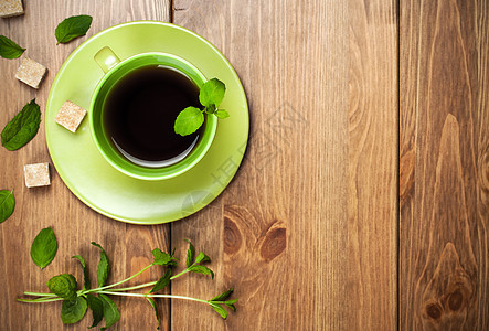 茶薄粉杯子药品叶子食物树叶草本植物棕色早餐桌子绿色图片