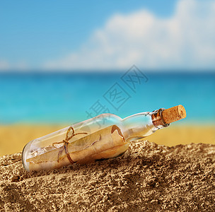 瓶中的消息海洋海岸邮件海滩天空支撑笔记帮助抛弃蓝色图片