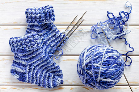 编织袜袜毛线爱好针织品衣服棉布装饰品针线活羊毛蓝色桌子图片