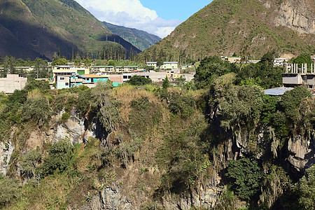 厄瓜多尔班诺人植物山坡水平乡村擦洗岩石建筑爬坡边缘房子图片