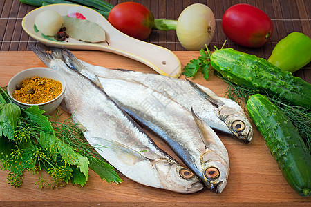 鱼和鱼料的成分 蔬菜 香料饮食鲤鱼产物盘子黄瓜香菜动物烹饪维生素季节背景图片