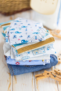 婴儿衣服纺织品配件蓝色男生孩子婴儿期织物折叠生活衬衫图片