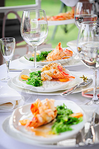 盘子里的龙虾贝类螃蟹海藻营养美食眼镜午餐小龙虾香料海鲜图片