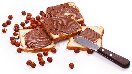 美味巧克力奶油烤面包可可桌子午餐坚果小吃榛子花生厨房房子早餐图片