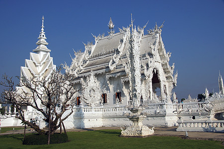 现代佛教雕塑 泰国的白神庙旅游天空宗教智慧头脑蓝色建筑学寺庙日落入口图片