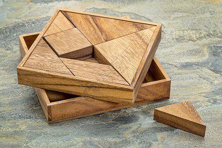 tangram  中文拼图游戏粮食木头板岩七巧板部分石头正方形游戏白色三角形图片