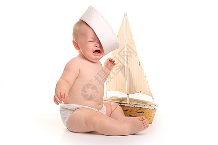 白背景的快乐可爱宝贝儿童年女儿眼睛蓝眼睛投标新生帆船水手男生女性图片
