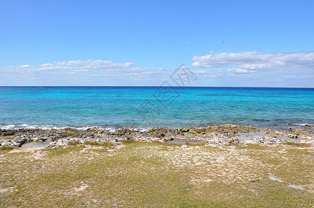 墨西哥海滩晴天阳光泡沫地平线海岸热带海浪天空天堂支撑图片