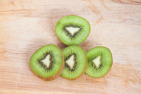 Kiwi 水果棕色绿色饮食白色食物热带素食主义者图片