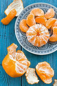 普通文橙食物热带果味水果皮肤早餐饮食盘子营养桌子图片