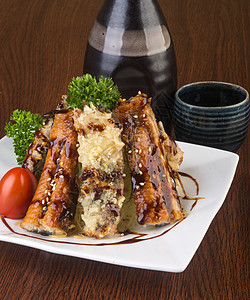 日食美食 在背景上不做或不做美食海鲜白色鳗鱼餐厅叶子寿司盘子食物午餐图片
