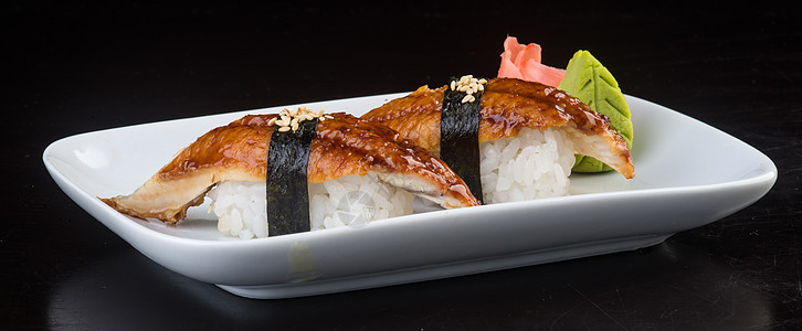 日美菜 寿司和背景美食白色饮食熏制海鲜海苔午餐美味海藻食物图片