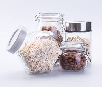 背景上混合的坚果燕麦子粮食薄片饮食纤维食物白色燕麦稀饭营养小吃图片