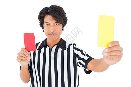 显示黄色卡片的斯特恩裁判体育黄牌犯规红牌运动足球官员男人惩罚男性图片