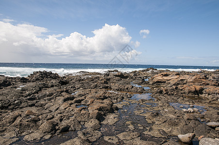 岩石海滩晴天液体天堂海岸蓝色海浪热带图片