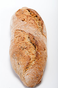 传统烤熟面包的大型小面包玉米食物麻布早餐饮食乡村谷物燕麦耳朵粮食图片