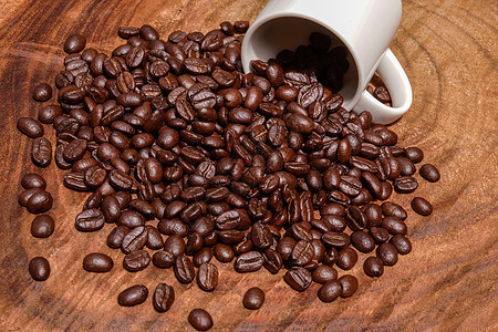 木制背景的咖啡豆酿造咖啡馆休闲咖啡公司时光咖啡厂烘烤咖啡茶几时间图片