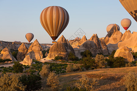 土耳其卡帕多西亚 卡帕多西亚最大的旅游景点 日出时气球飞行空气闲暇烟囱月球丘陵洞穴篮子地标场景仙境图片