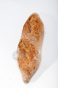 传统烤熟面包的大型小面包种子脆皮乡村厨房粮食面粉宏观耳朵小麦谷物图片