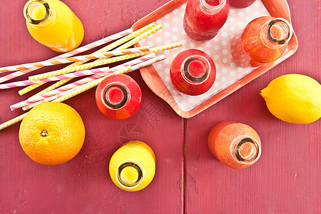 冰沙的多样橙子柠檬水果瓶子果汁维生素条纹早餐托盘西瓜图片