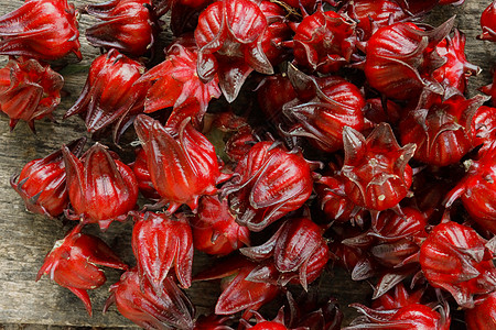 洛神花或玫瑰水果木槿花萼国家蔬菜拉丁输液热带农场树叶茶点背景