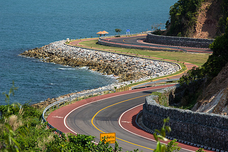 绕风路海岸爬坡曲线绿色乡村旅行驾驶海洋天空旅游图片