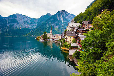 Hallstat村视图世界天空建筑物旅行历史性晴天房子假期蓝色遗产图片