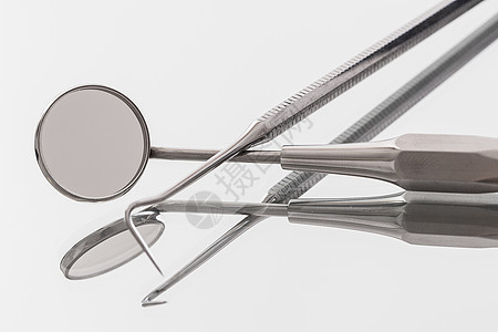 牙医乐器手术牙科保健医院探测医生疼痛镜子工具金属图片