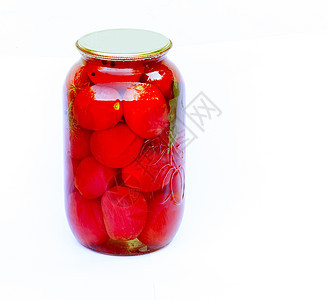 白色背景的大型玻璃罐中番茄罐头图片