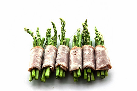将培根包装成孤立的paragus绿色餐厅石器草本植物红色食物小吃食谱时代餐饮图片