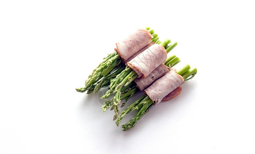 将培根包装成孤立的paragus绿色蔬菜鱼片时代食物小吃熏肉石器红色草本植物图片