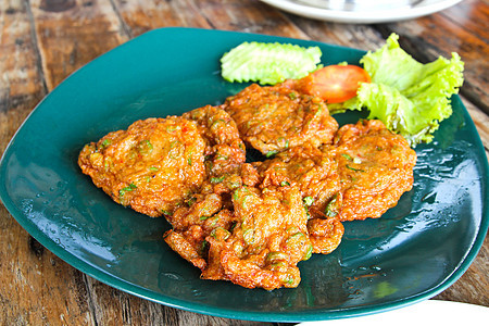 泰国鱼肉饼天字普拉午餐盘子蛋糕香料文化美食海鲜食物红色小吃图片