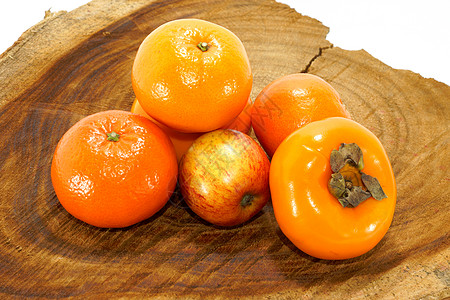 木头上的橙 苹果和过膜饮食市场柿子杂货园艺柚子橙子食物团体收藏图片