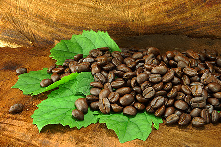 木制背景的咖啡豆酿造休闲烘烤咖啡公司咖啡早餐咖啡厂茶几咖啡馆时光图片