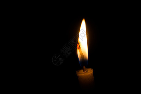 黑暗中的蜡烛烛光燃烧宗教黄色黑色火焰哀悼白色庆典背景图片