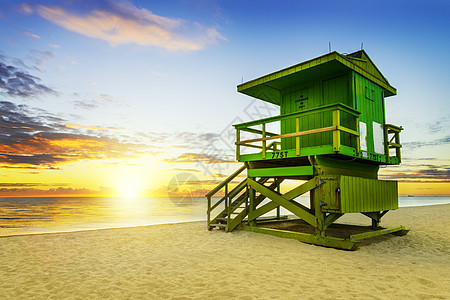 迈阿密南海滩日出金子救生塔海滩橙子天空场景蓝色地平线海岸线海洋图片