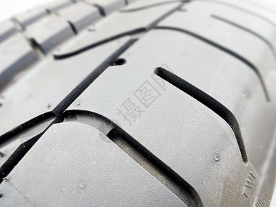 轮胎在轮胎修理厂的缝合时间作坊橡皮沉淀弧度蓝色街道季节服务空闲图片