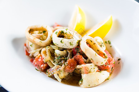 海食沙拉美食盘子贝类洋葱季节乌贼午餐柠檬市场螃蟹图片