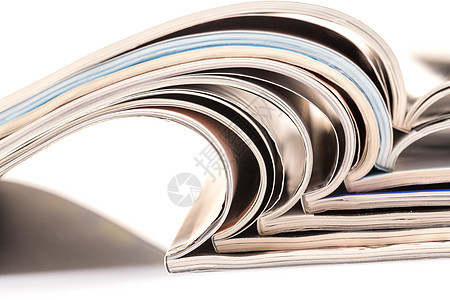白色背景的杂志堆叠打印经济学政治出版物图书馆团体文章商业期刊小册子图片
